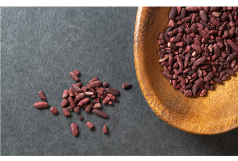 A bowl with red yeast rice