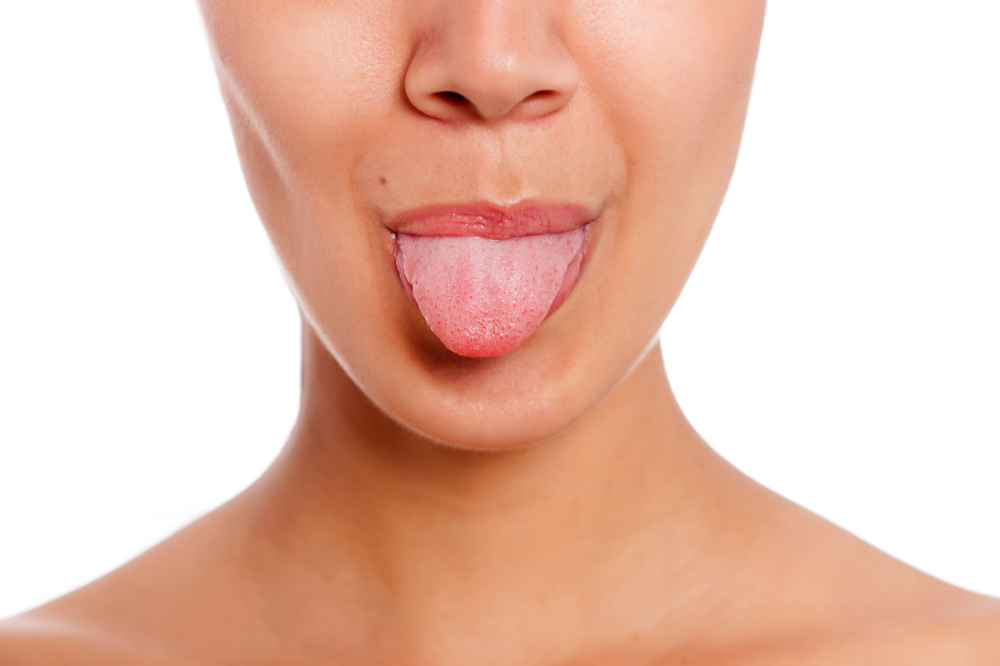 woman shows her tongue